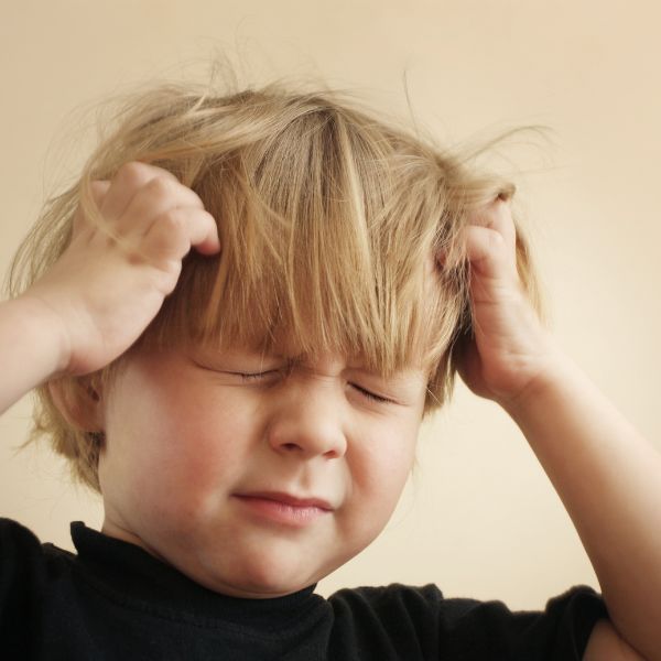 boy with itchy head