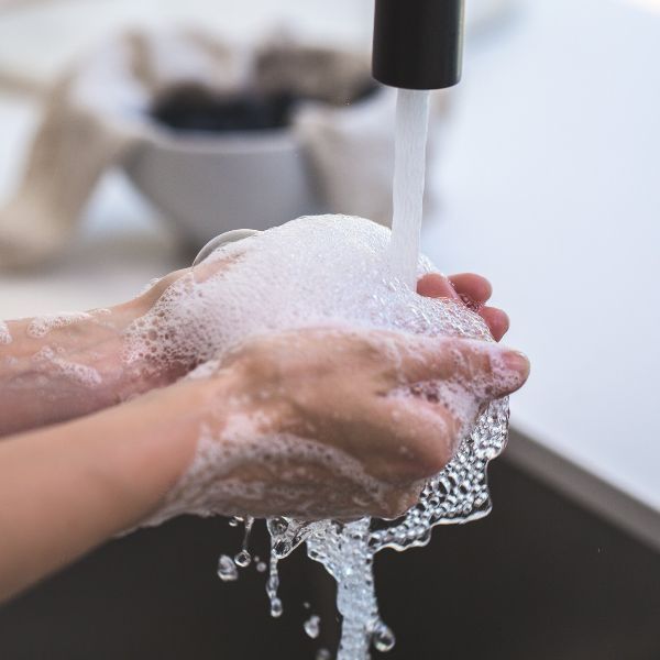 Washing hands.