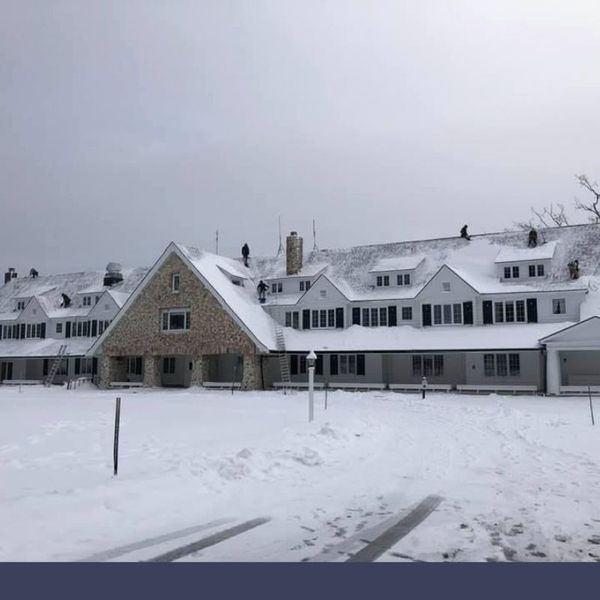 large home covered in snow
