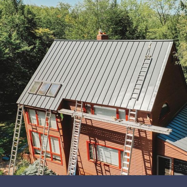 house with ladders on the side of it