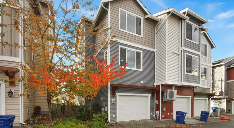 House with orange tree leaves on it