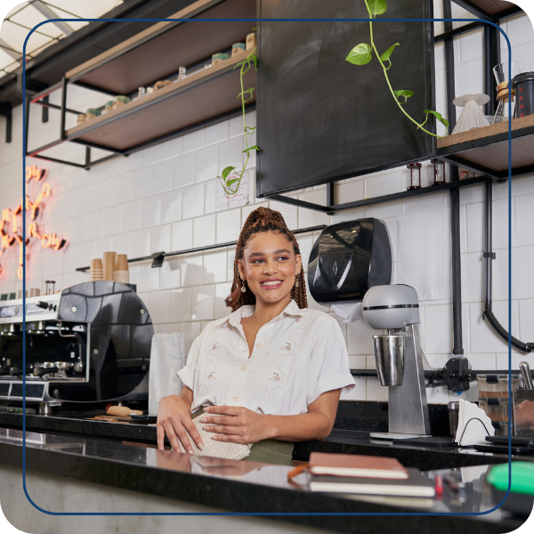 Smiling Business Owner in Kitchen Online Accounting5.png