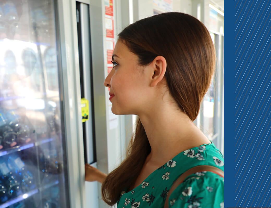 Woman at vending machine