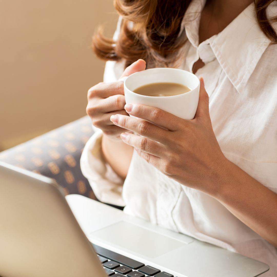 business woman with coffee and computer