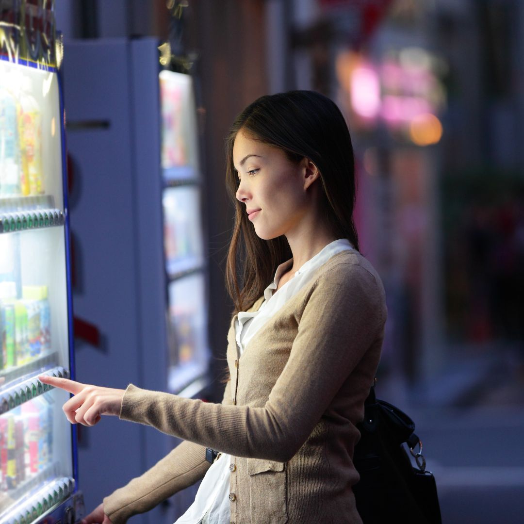 employee at vending machine