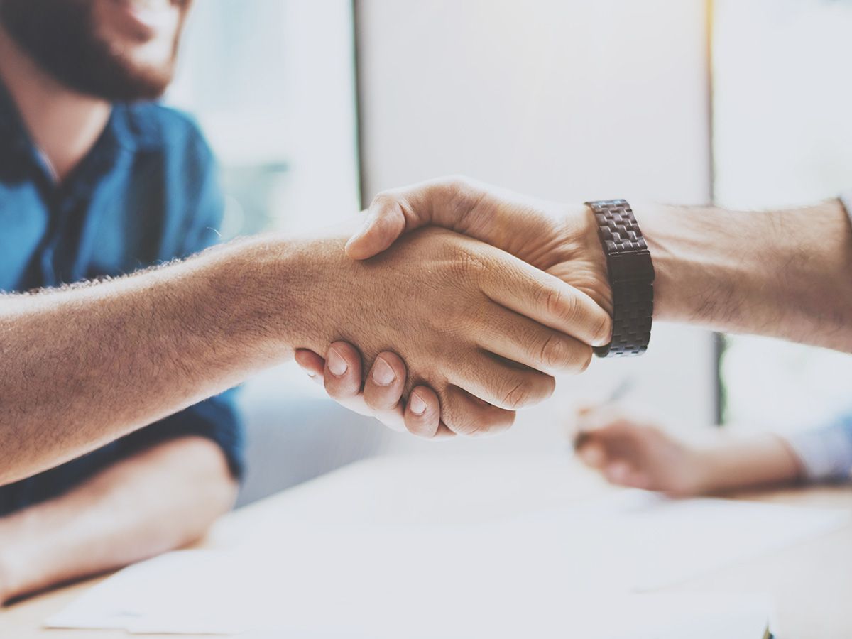 Image of people shaking hands