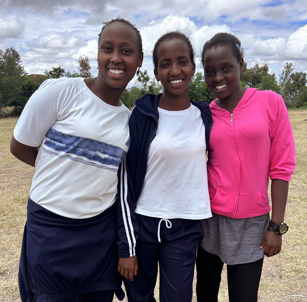 Saruni International participants smiling for a photo