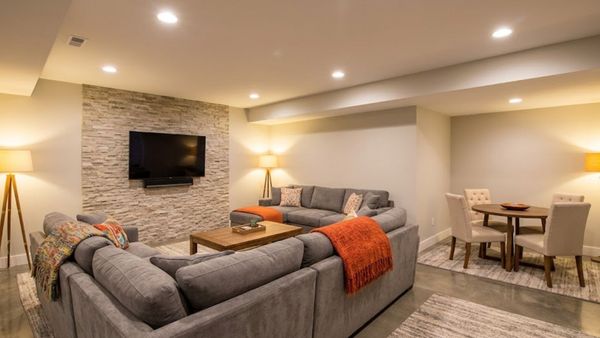 finished basement with large sofa