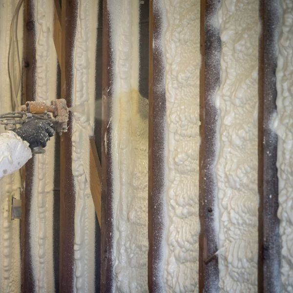 Spraying foam insulation