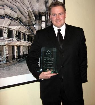 Jon receiving award