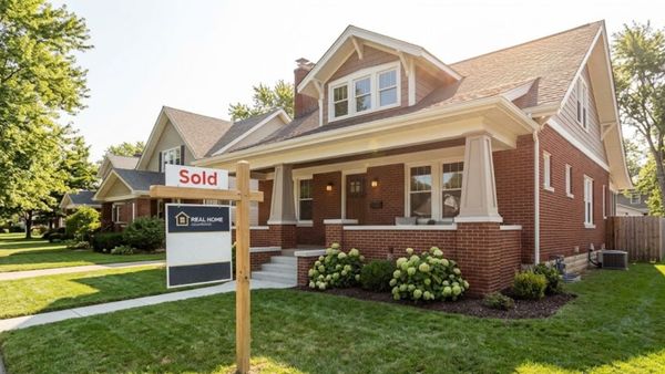 home with for sale sign