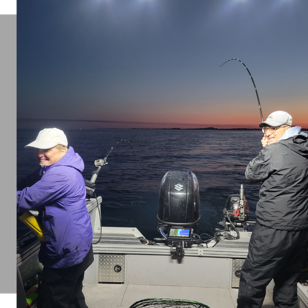 people fishing on a boat at sunset people fishing on a boat at sunset