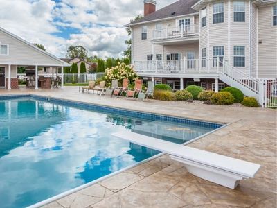 Apartments with pool and club house, with a faux natural stone patio Apartments with pool and club house, with a faux natural stone patio