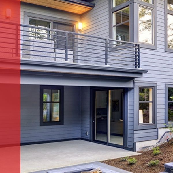 Home with small concrete patio and balcony