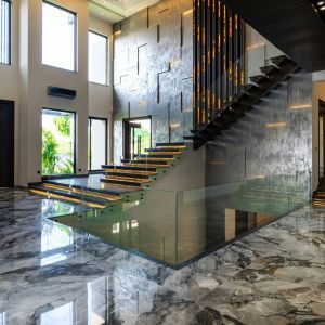 Grey, white, and black epoxy flooring in home