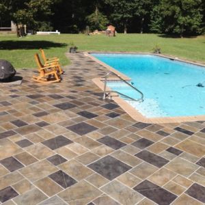 Multicolored stamped concrete pool deck