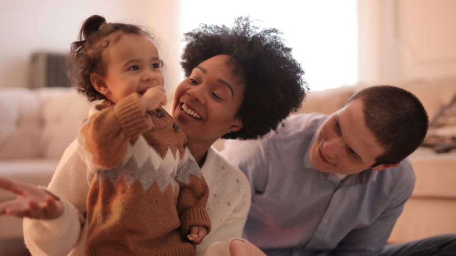 Parent and child playing.