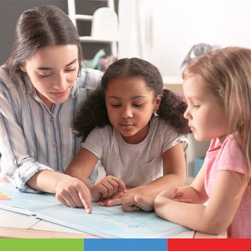 teacher reading with students