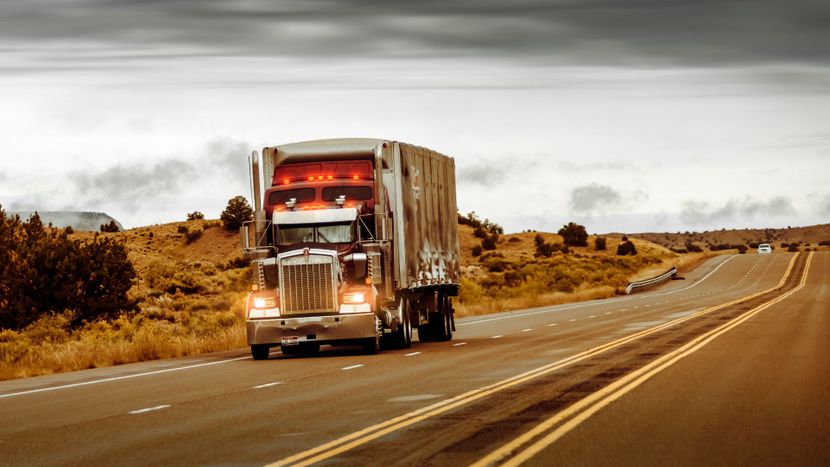 semi driving on road