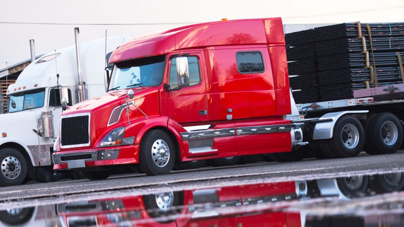 red and white freight trucks