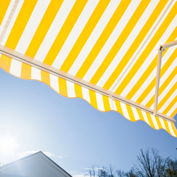 yellow and white stripped awning extended