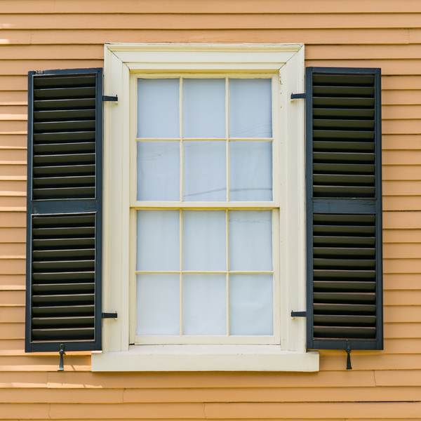 Green colonial shutters