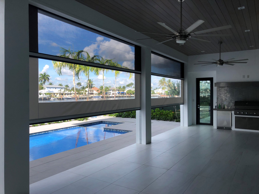 motorized screen near pool from interior view