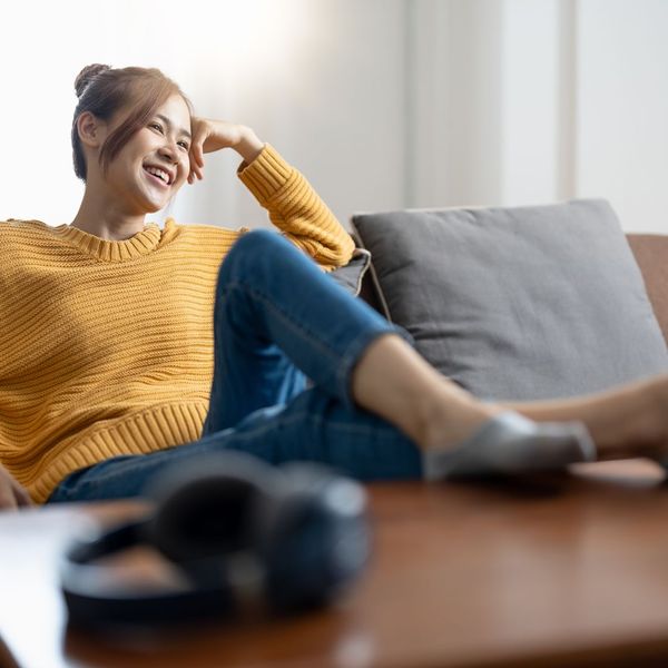 smiling woman on couch