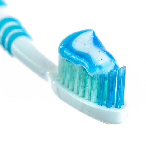 toothpaste on a toothbrush