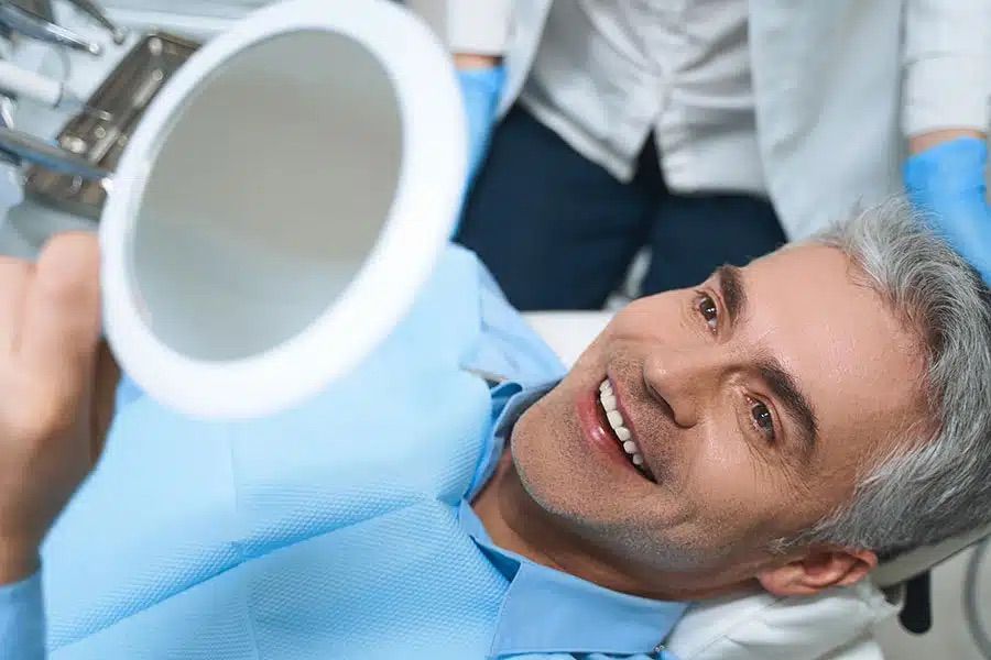 happy patient in dentist office happy patient in dentist office