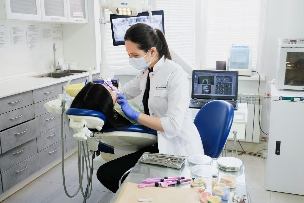 dentist with patient dentist with patient