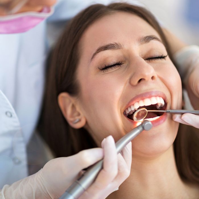 image of a woman at the dentist