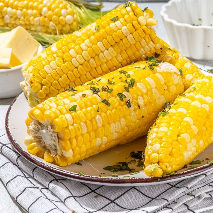 corn on the cob served on a plate