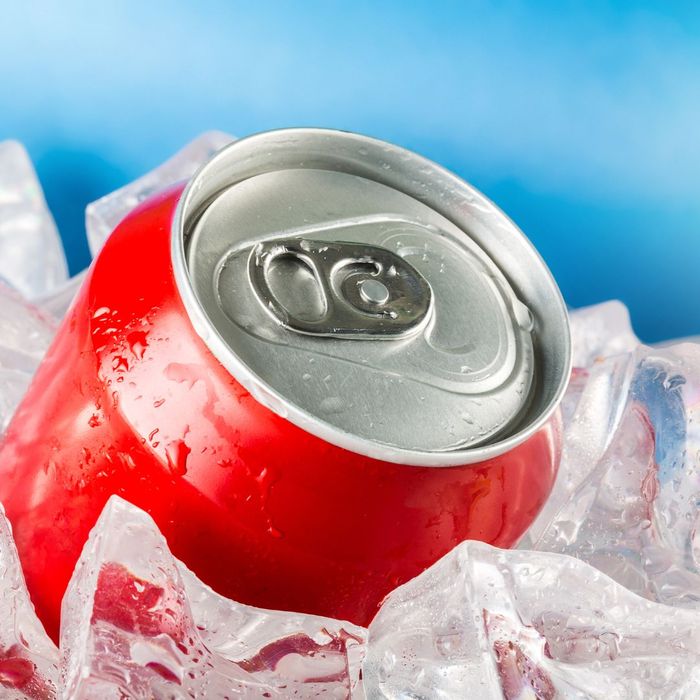 can of soda on ice