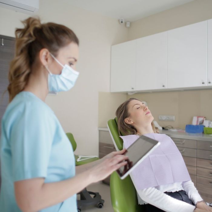 orthodontist using tablet