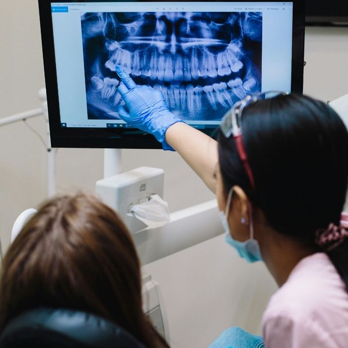 looking at xrays with patient 