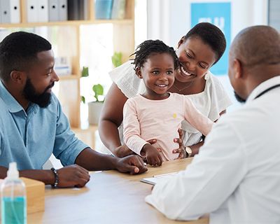 doctor speaking with child