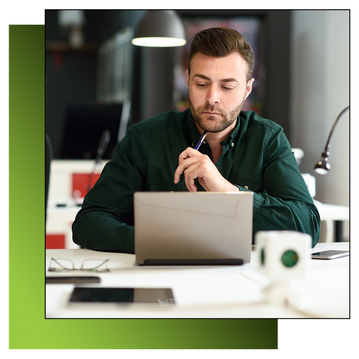 Man doing personal taxes on computer