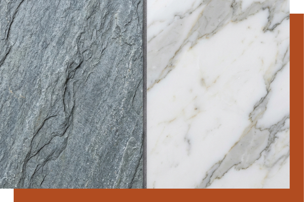 Close-up view showing the contrasting textures of natural slate and polished marble tiles.