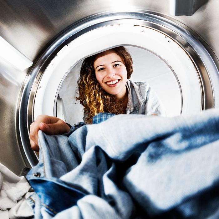 image of a woman doing laundry