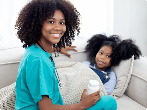 african american woman taking care of african american child