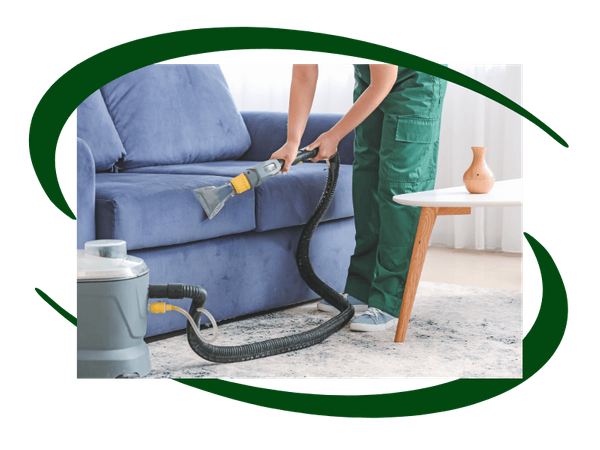 person cleaning upholstery