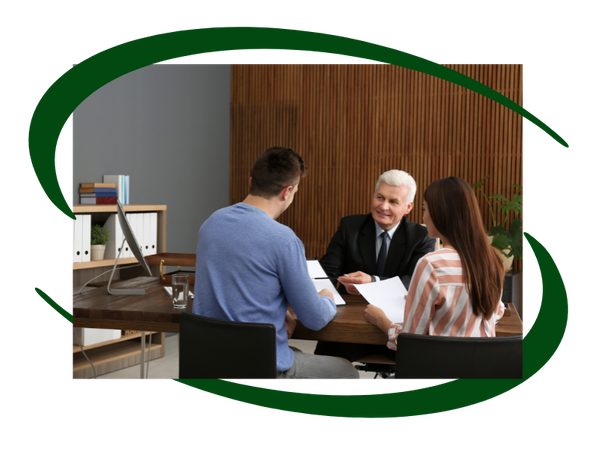 man working with 2 clients in his clean office