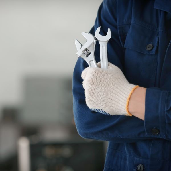 mechanic holding tools