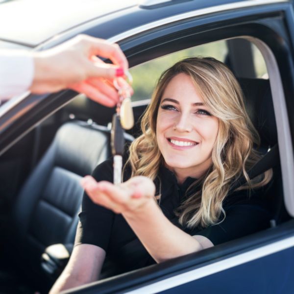 woman getting car key replacement