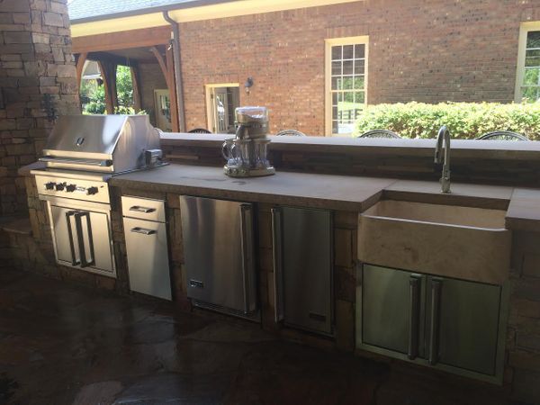 Outdoor kitchen by StoneAge Stonescapes