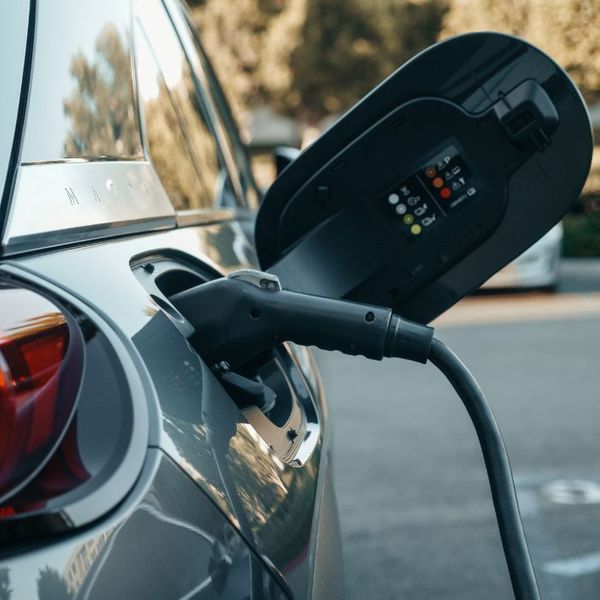 electric vehicle plugged in at EV charger