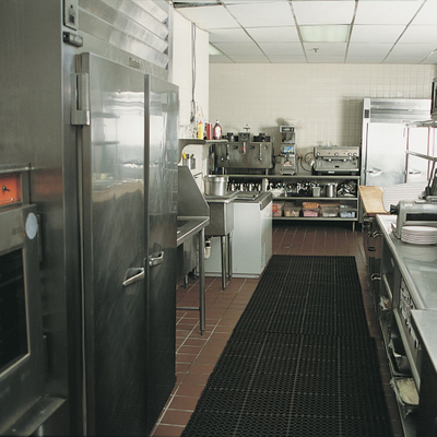 Restaurant kitchen with refrigerator