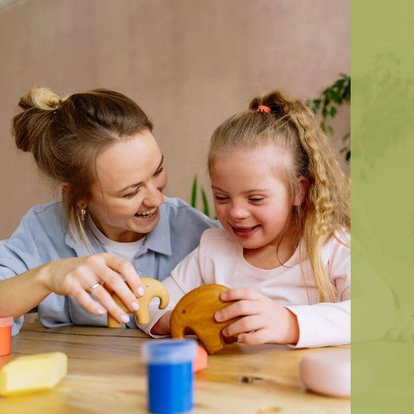 child with aba therapist