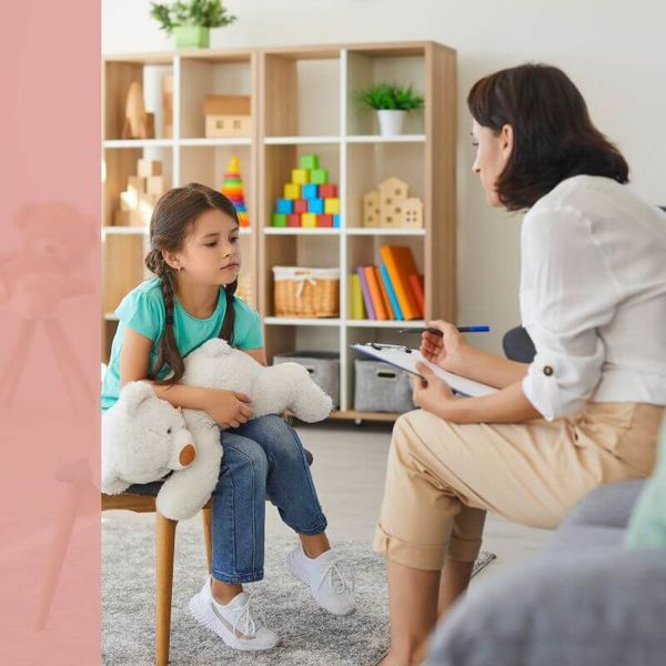 child with aba therapist